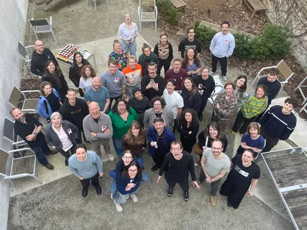 Makers and organisers of Make a Mark Brussels in a courtyard, photographed from above
